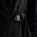 Close up shot of magnetic buckle in easy-grip buckle wrap shirt.